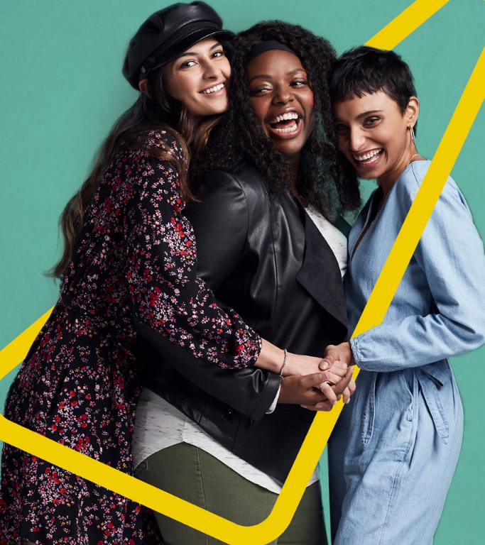 Three girls hugging